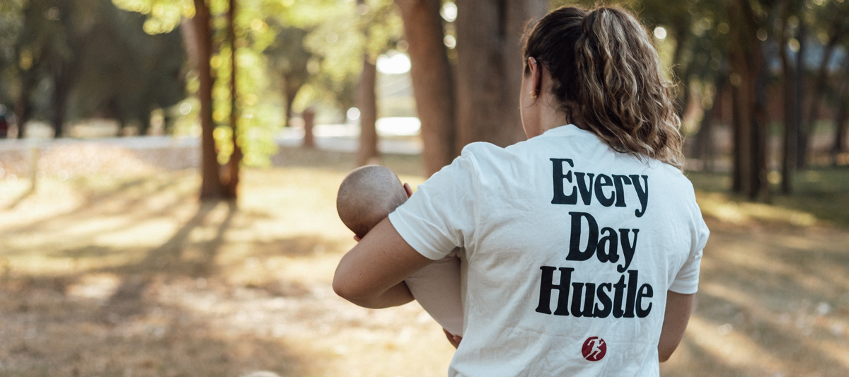 Mom wearing a Every Day Hustle shirt
