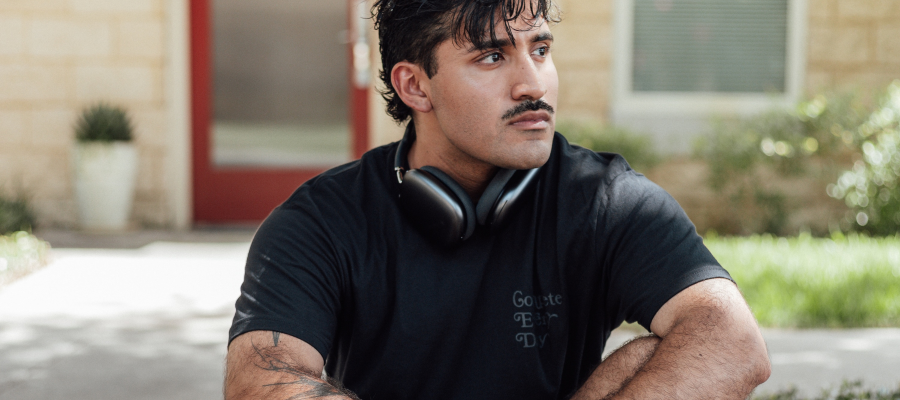Athlete wearing black Compete Every Day shirt