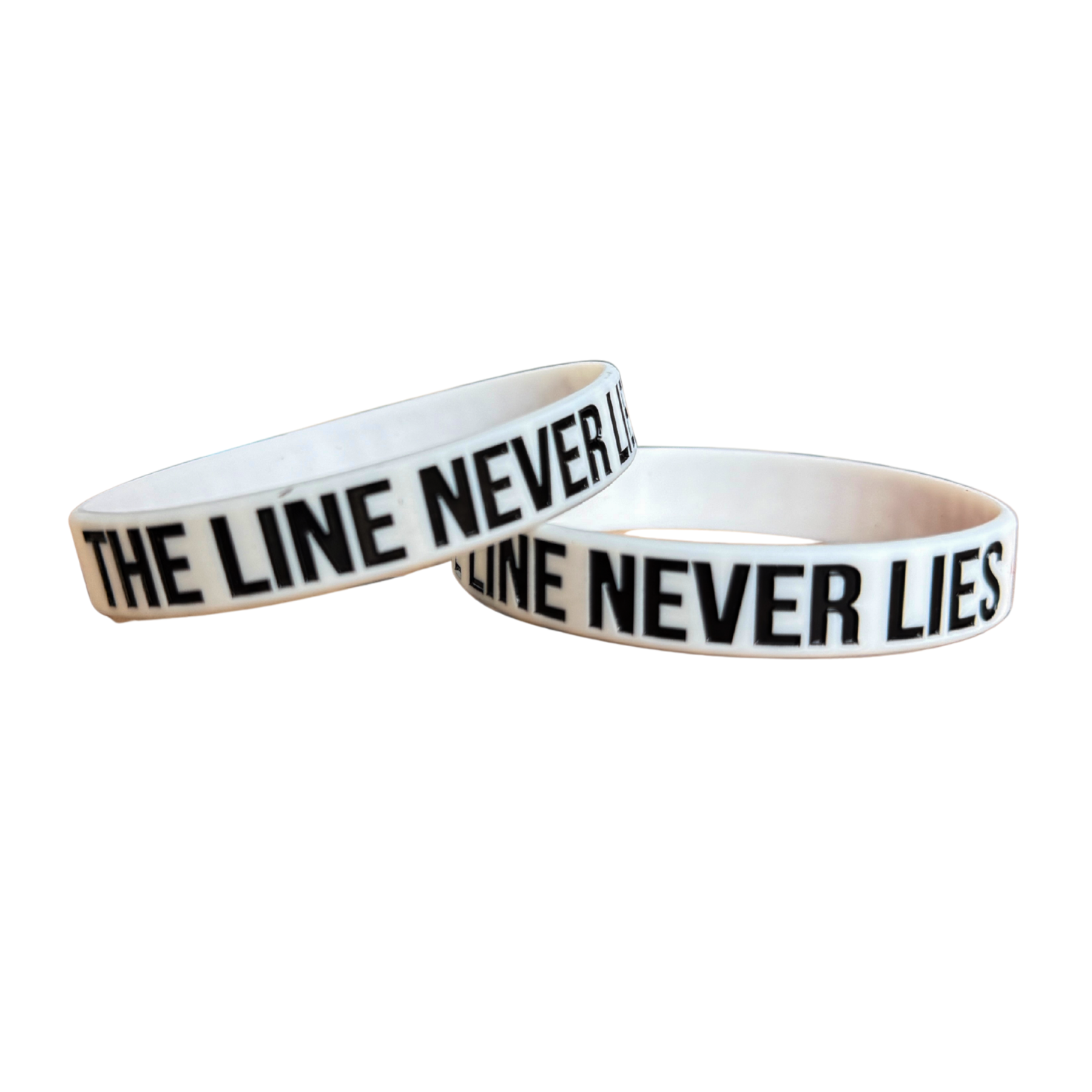 The Line Never Lies white Compete wristband